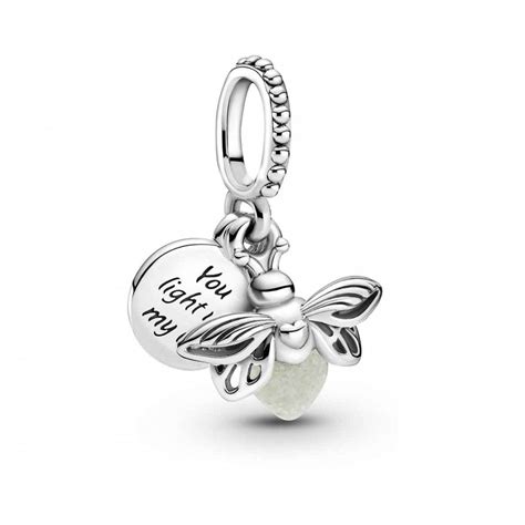 Firefly pandora charm - Light up your look with the Glow-in-the-dark Firefly Dangle Charm. Hand-finished in sterling silver, this firefly charm features rounded glow-in-the-dark glass – white in the daylight and milky green at night – which recharges when exposed to sunlight or UV light. A second silver disc reads 'You light up my life.'